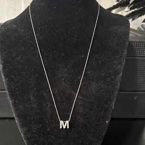 Sterling silver and diamond M necklace